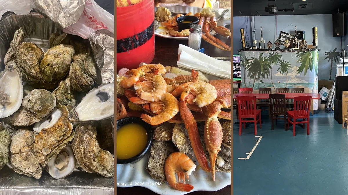 Seafood restaurant dining room with tables and bar seating.